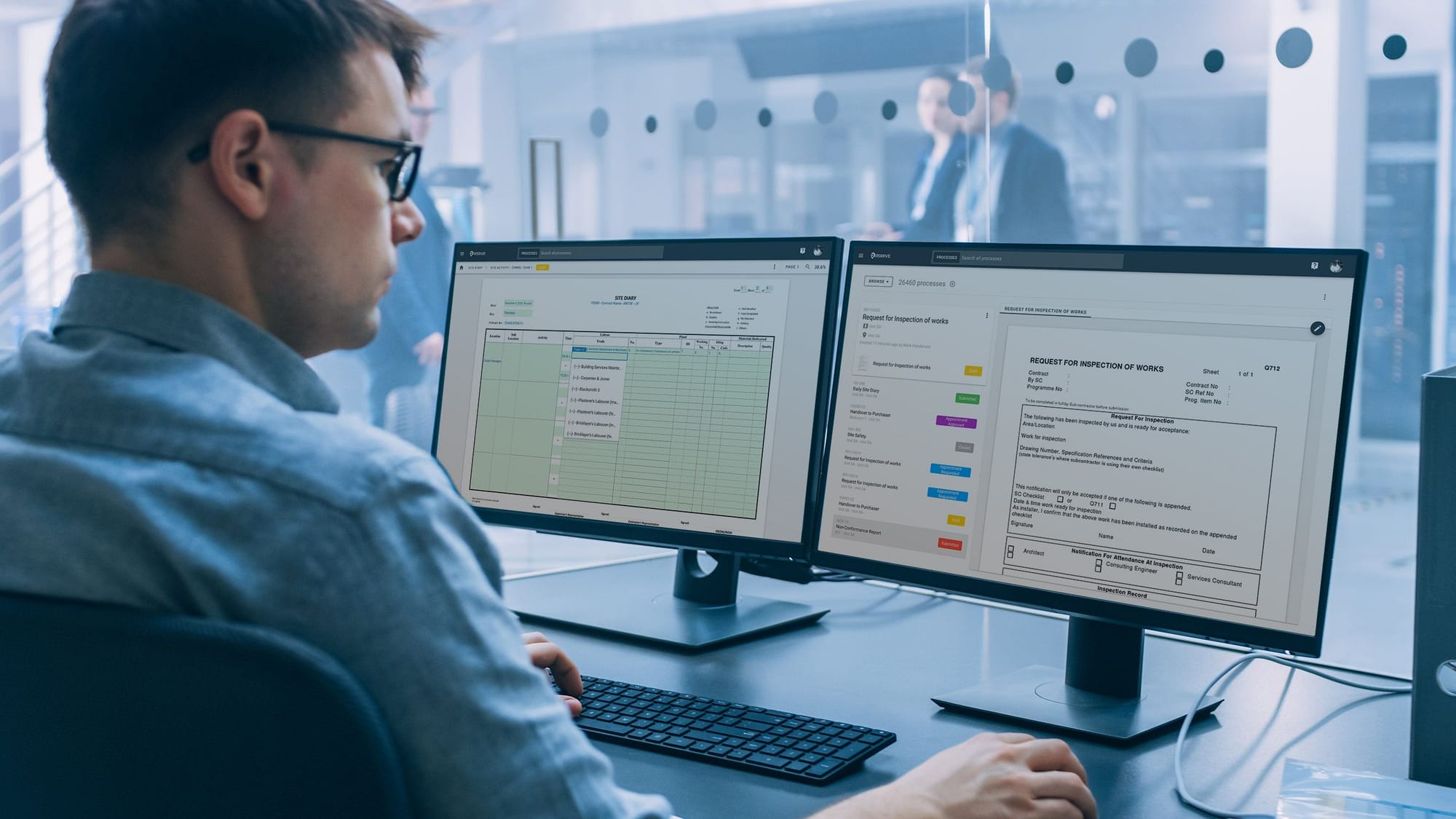 Engineer reviewing an inspection request and its data table across two monitors in RDrive Field